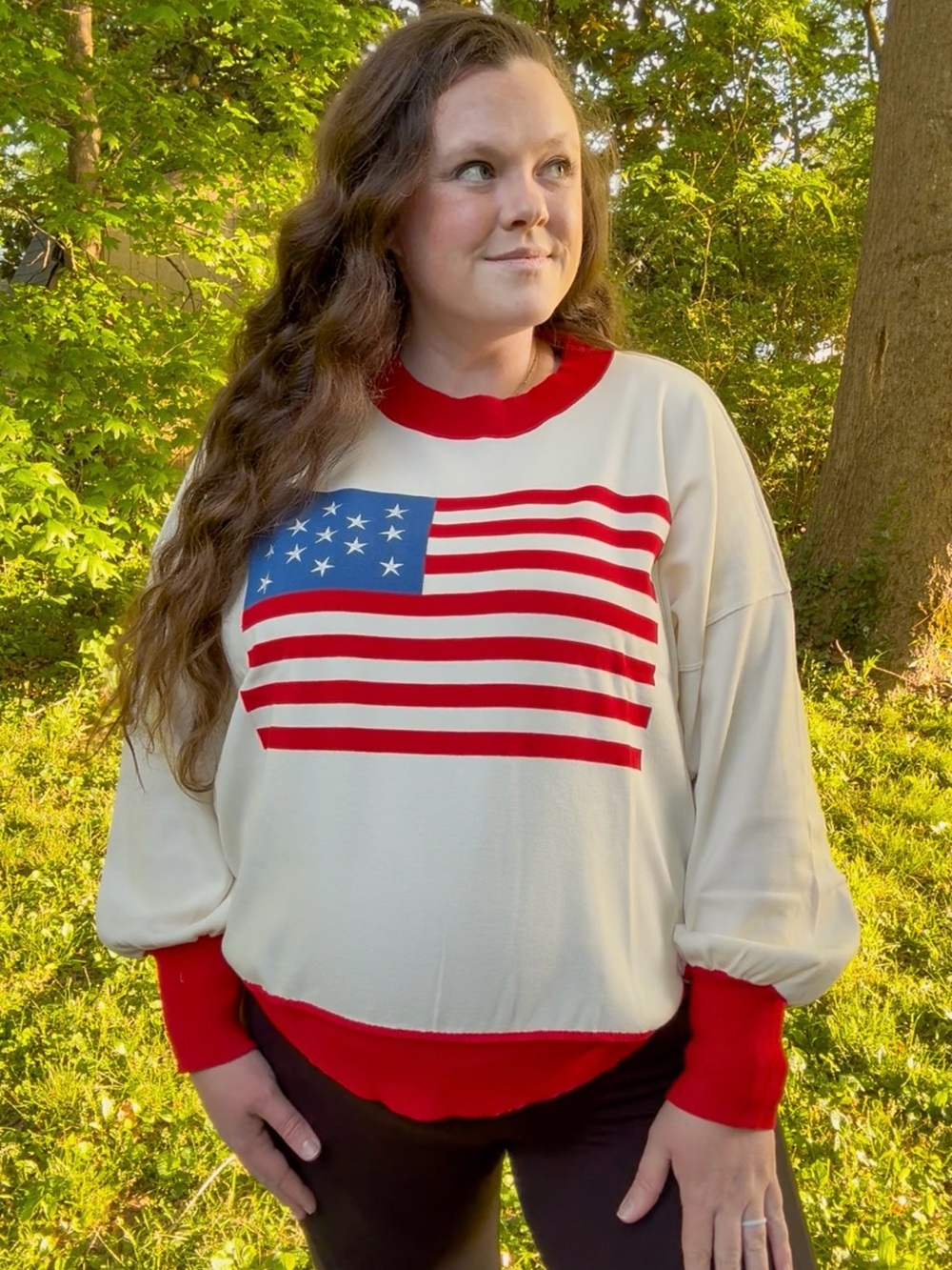 Cream Pullover Sweatshirt with Red & Blue Flag Graphic